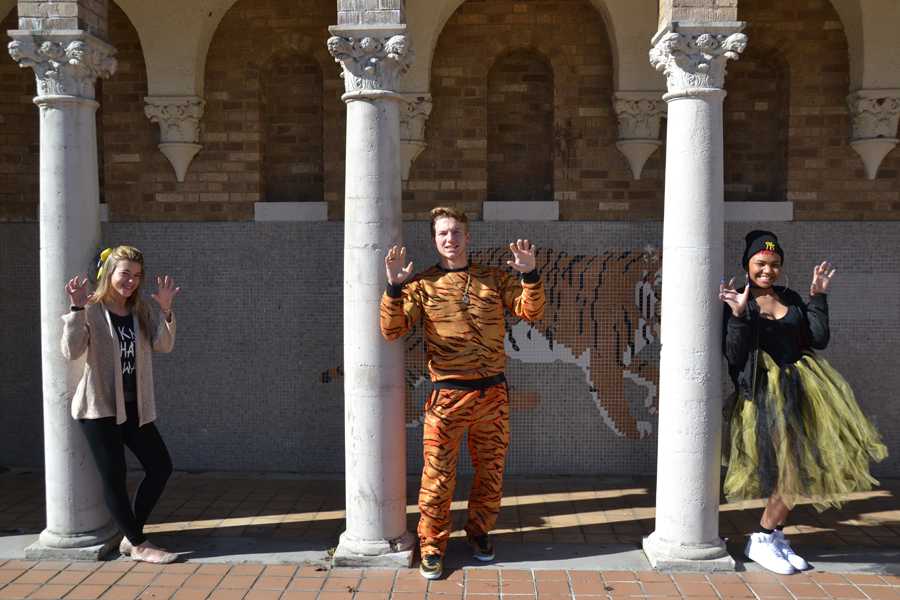 Seniors Arianna Minarelli, Collier Byrd, and Mikiah Simmons dress up for their final homecoming week on Black & Gold Day, Thursday, Jan. 26. The homecoming basketball game was Friday, Jan. 27, at Home against the Catholic High Rockets.