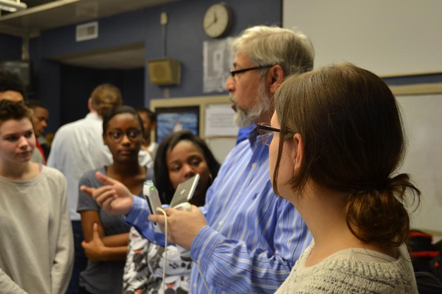 Physical science teacher Kim Burleson’s students look on as Dr. Noor Akhter from UAMS demonstrates an on-the-go ultrasound machine on Wednesday, Jan. 18.