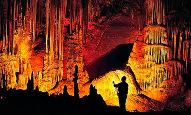 The cavern features an abundance of natural beauty, including stalactites hanging dozens of feet above visitors heads.