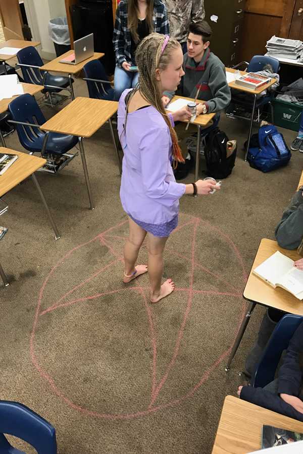 Has bad karma plagued the Tiger staff or has superstition taken control? Junior Aidan Massanelli participates in the cleansing led by Lila Dell Leveritt.
