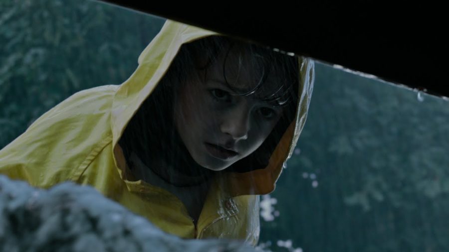 Georgie Denbrough peeks into the sewer where his paper boat, made by his brother Bill, has fallen. Moments later it is returned to him by Pennywise the clown, other wise known as ‘It’. Georgie’s death is the first of the film and kick starts the plotline. (Photo courtesy of Google Images)