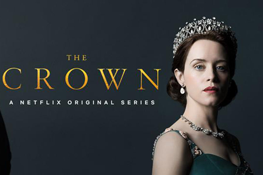 Differing from the season on poster that featured only Foy, Claire Foy and Matt Smith as Elizabeth II and Prince Philip respectively are depicted in their full regalia on the season two poster. Foy gives the camera a head on, steely gaze reflecting her character’s new found strength and confidence in the role of Queen after having to assimilate to the role unexpectedly after the death of her father in season one. This will be the last season with both Foy and Smith in the main title roles. Netflix has planned a full recasting to reflect the age of the Queen and Prince in season three. Casting is still in process, but Broadchurch actress Olivia Coleman has been announced as taking of the monarchal role from Foy for seasons three and four. 
(Photo courtesy of Netflix)