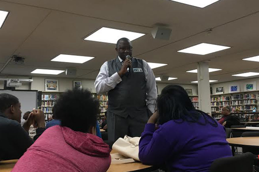 Frank Stewart speaks to students on the impact of the absence of a father figure. (Photo by Fran Delacey)
