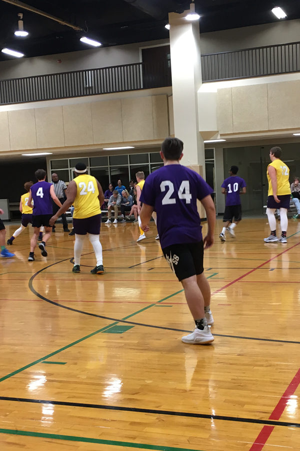 The yellow team prepares to defend against the purple team. (Photo by Annalise Novicky)