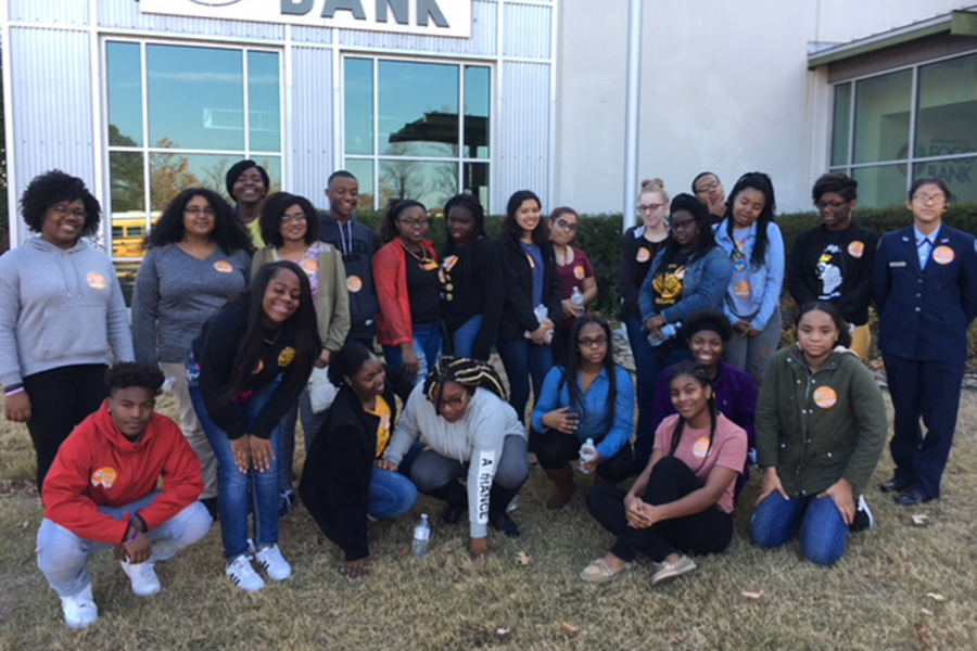 Gifted and Talented Seminar Club volunteers at the Arkansas Food Bank organizing canned good to feed the homeless. (Photo courtesy of Sharolyn Jones-Taylor)