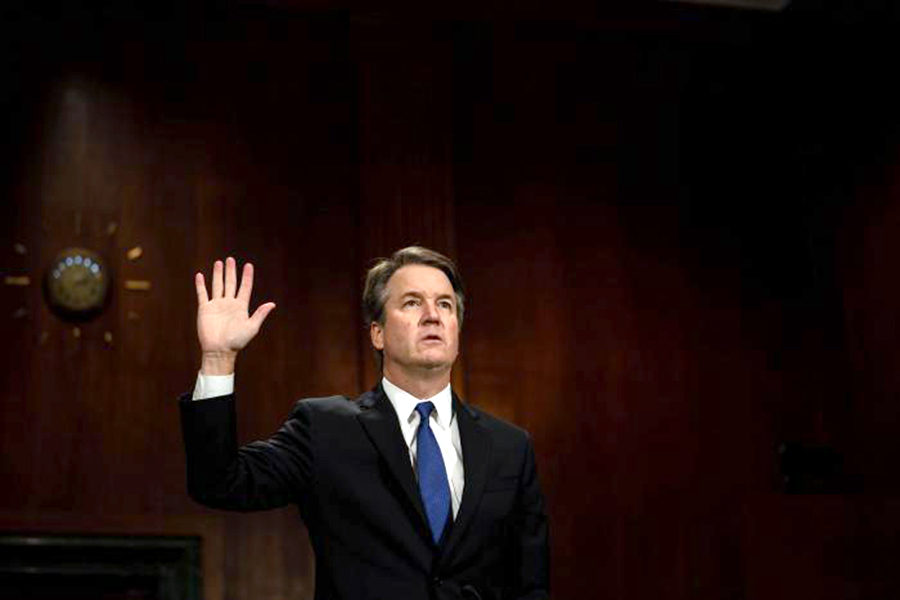 Supreme Court nominee Brett Kavanaugh is sworn in before the Senate Judiciary Committee in Washington, D.C., on September 27, 2018. He testified before the committee to defend himself in the face of allegations of sexual assault from Dr. Christine Blasey Ford. (photo Courtesy of Erin Schaff/UPI)
