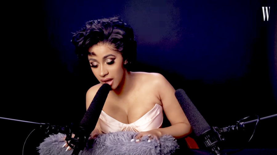 In collaboration with W magazine, rapper Cardi B whispers into microphones in order to induce a tingly sensation in listeners. (photo courtesy of W Magazine)