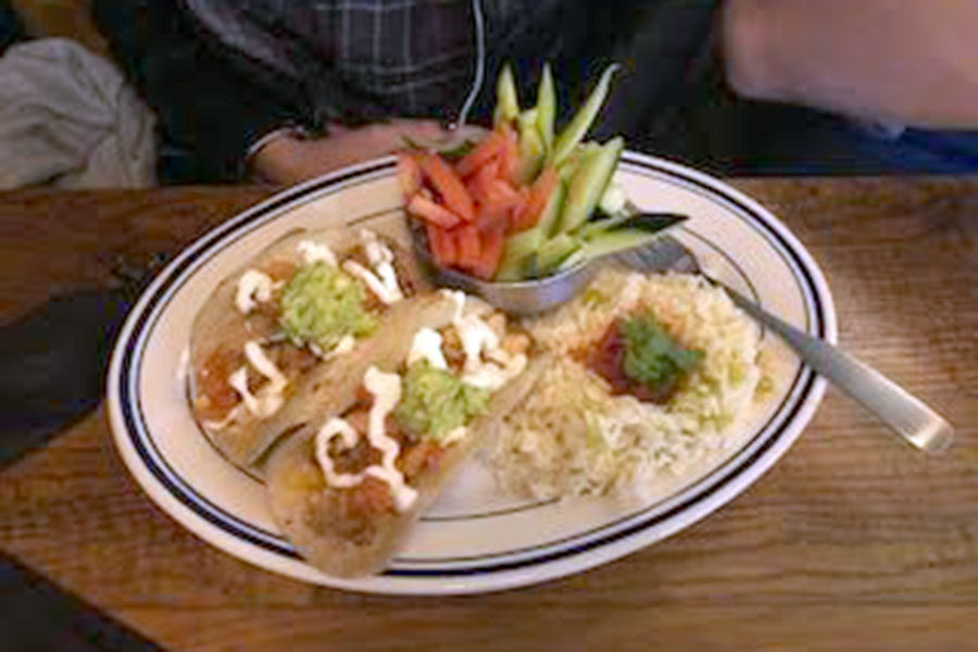 Heights Tacos and Tamales chicken tacos have become a fan favorite to frequent customers. (photo by Parker Gunn)