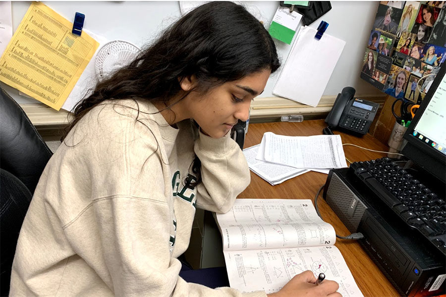 Junior Sarah Thomas studies for the ACT at least once a week. Sarah credits her score increases to her strong study habits.  (photo by Lily Ryall)