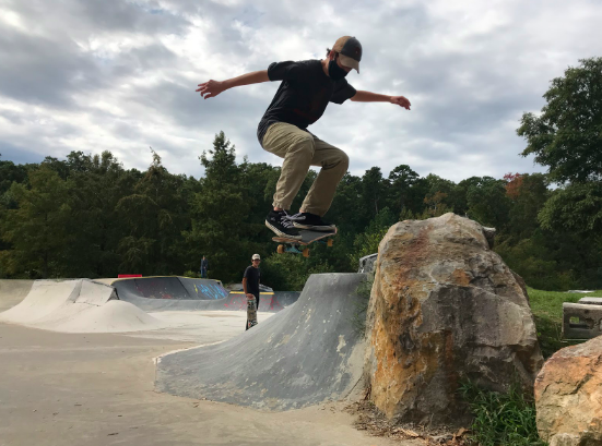 Freshman Hugh Jarvis Ollies down the “Rock Drop” at Kanis Park.
