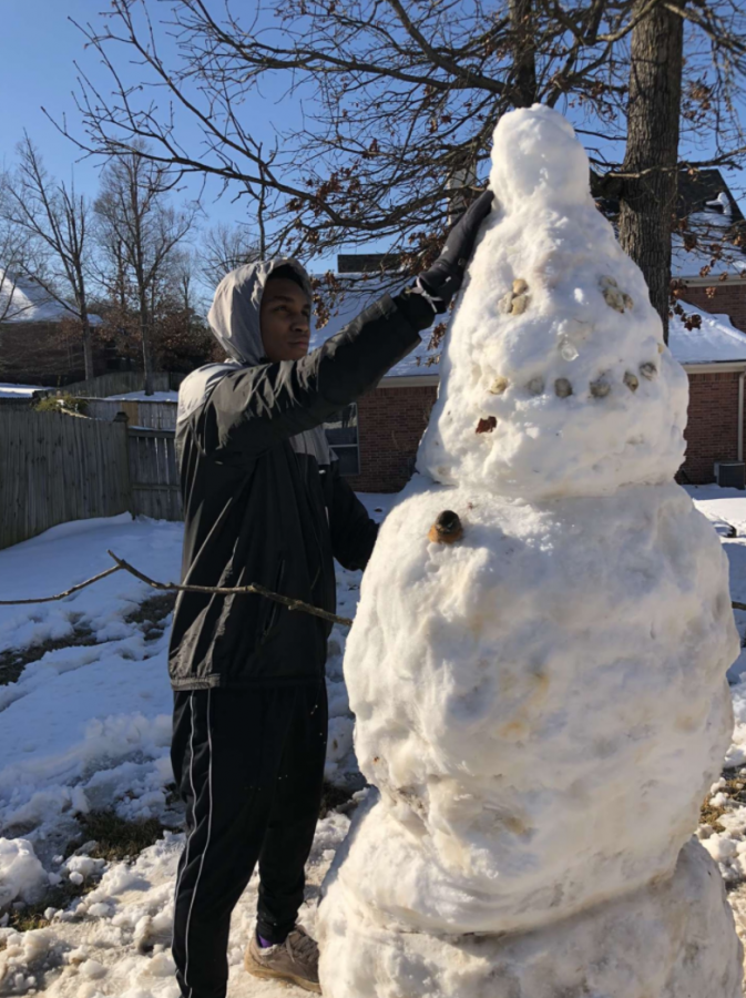 Junior Jackson Cobbs attempts to build the biggest snowman in his neighborhood. “I couldn’t let these other little kids show me up in my own neighborhood, so I had to build a 7 foot tall snowman to show them wassup,” Cobbs said.