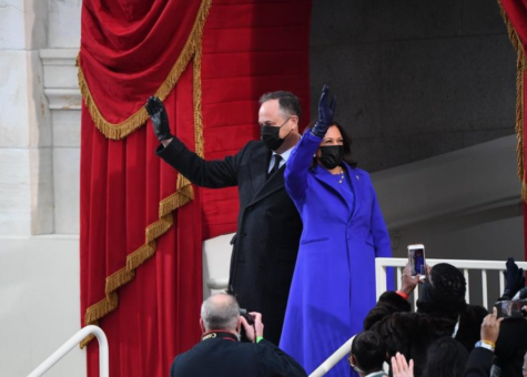 Vice President Kamala Harris is sworn in wearing a coat and dress designed by Louisiana native Christopher John Rogers. 