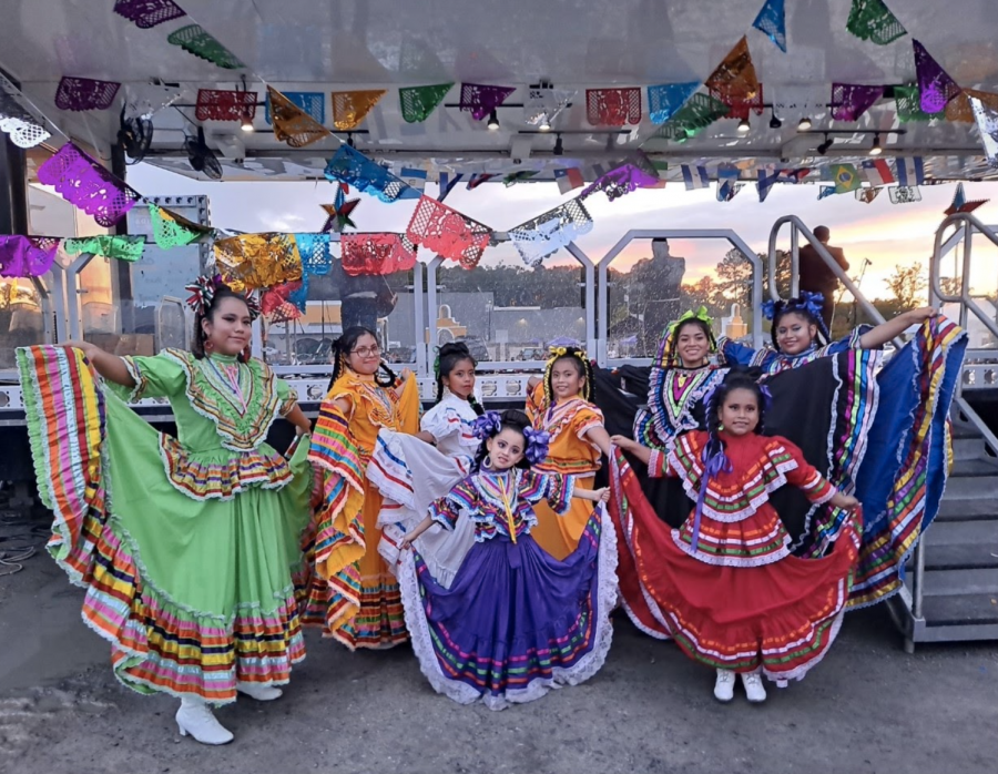 The folkloric dance team poses for a picture at a Hispanic Heritage event in Southwest Little Rock.
