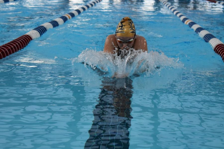 Senior Alexa Coughlan races to second place in the 100yd breaststroke. Coughlan recently committed to Birmingham Southern College to continue her swim career. 