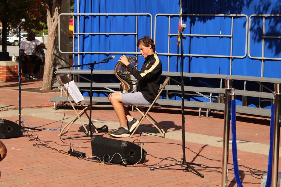 Walt Hill plays his French horn at SpiritFest. 