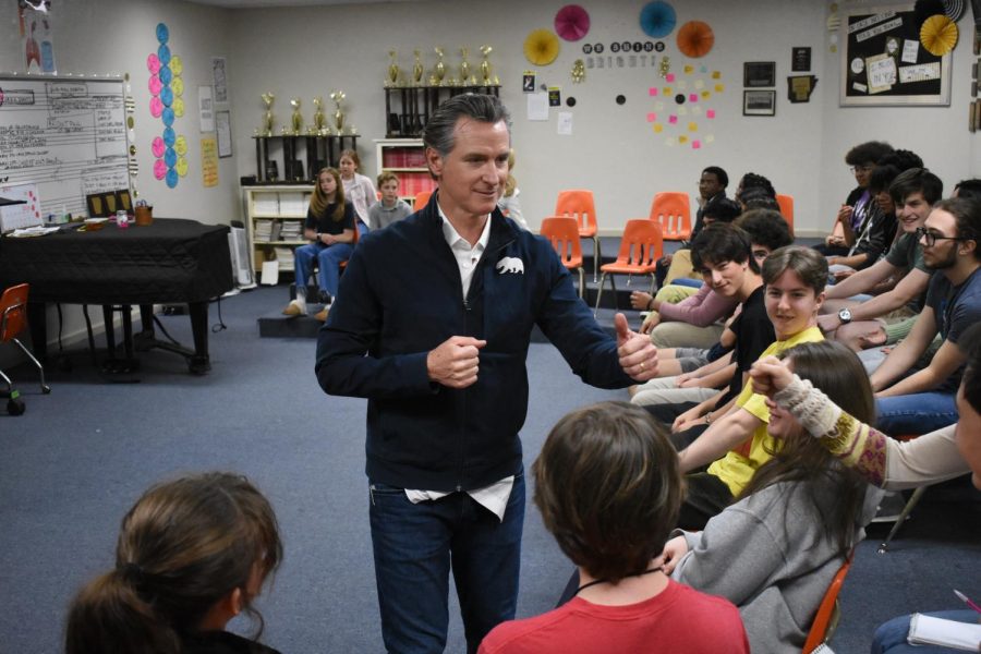 Gavin+Newsom+greets+Adam+Kirbys+AP+Comparative+Government+Class+in+the+choir+room+with+fist+bumps.+
