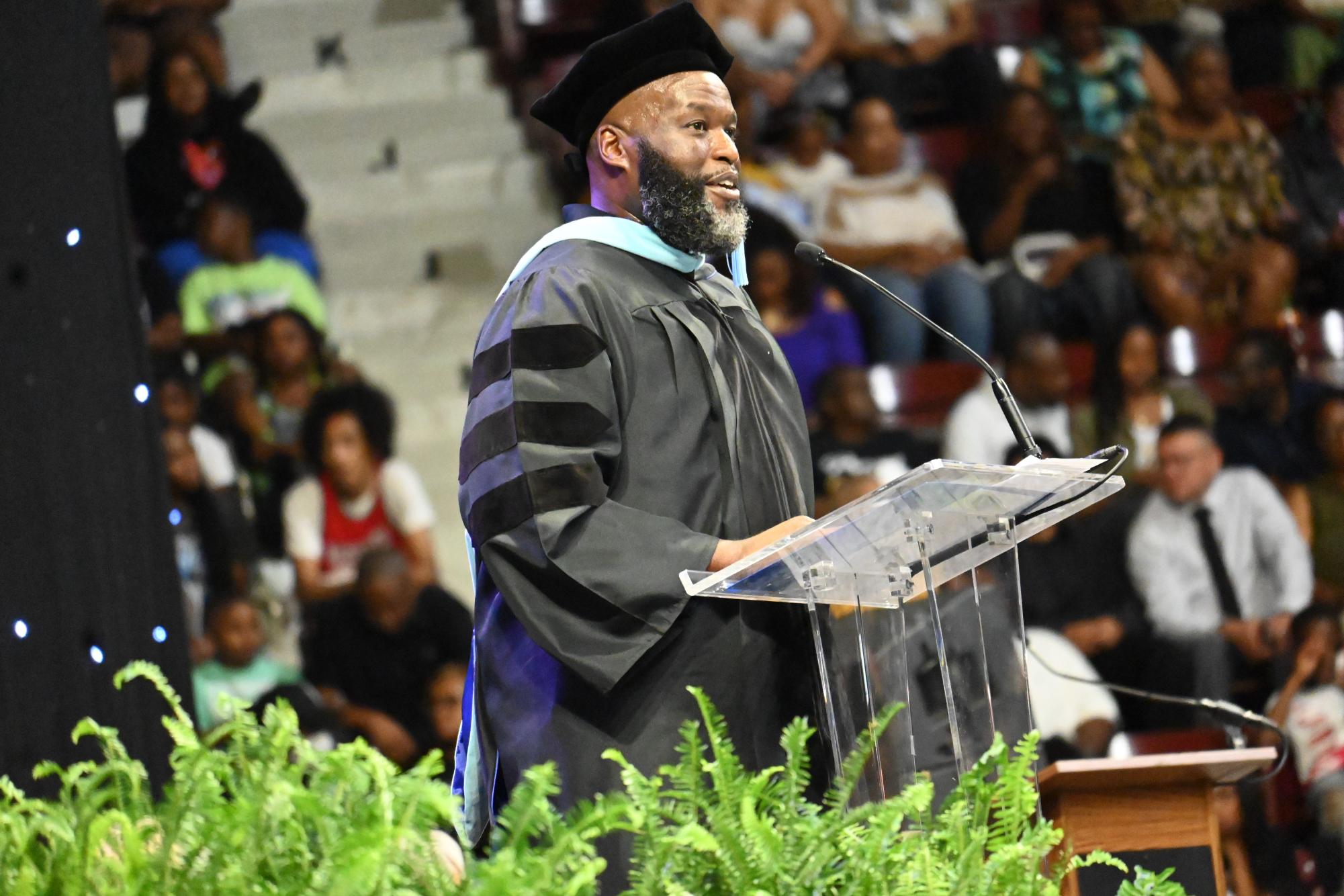 Superintendent, Jermall Wright speaks to the newly graduates. Photo by Elizabeth Rigsby