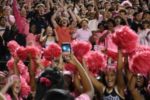 Student council records the cheer of the student section, after the winning touchdown, against NLR 28-21.
