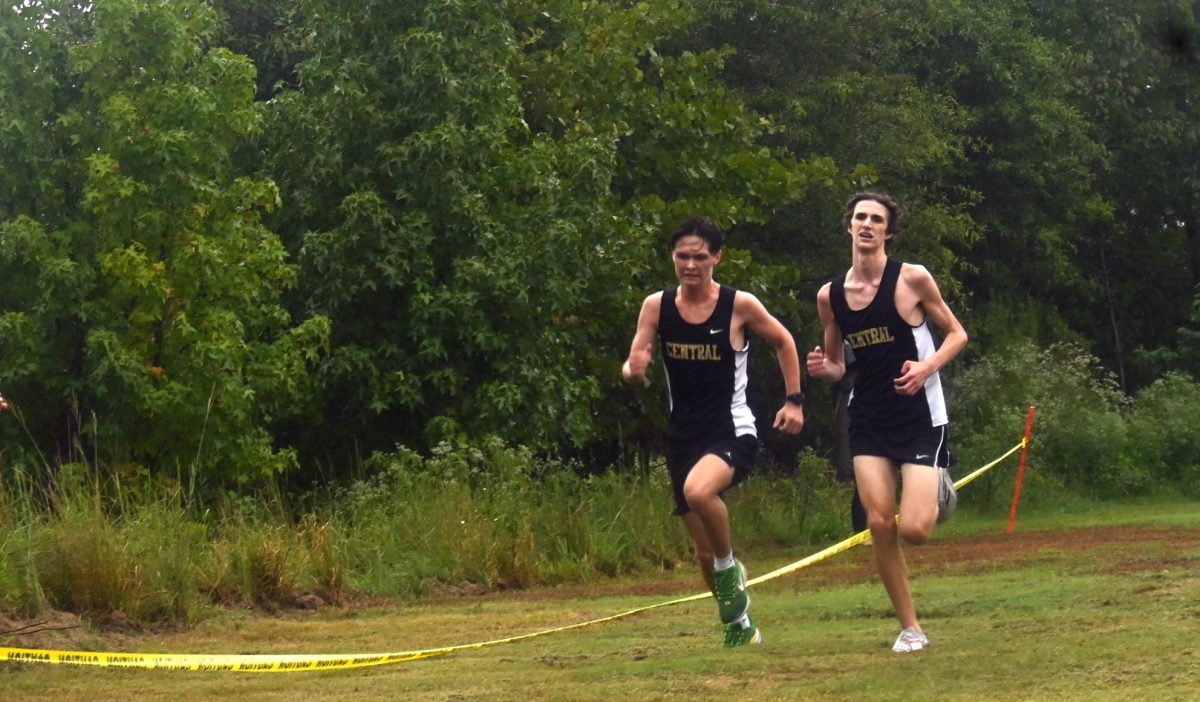 Sophomores Solomon Sanford and Everett Forest run in a cross country meet in Maumelle Sept. 6. Forest began running in sixth grade and joined the school team as a freshman. "It's just a fun thing to do in my free time... It's very fun to run with my team," Forest said.