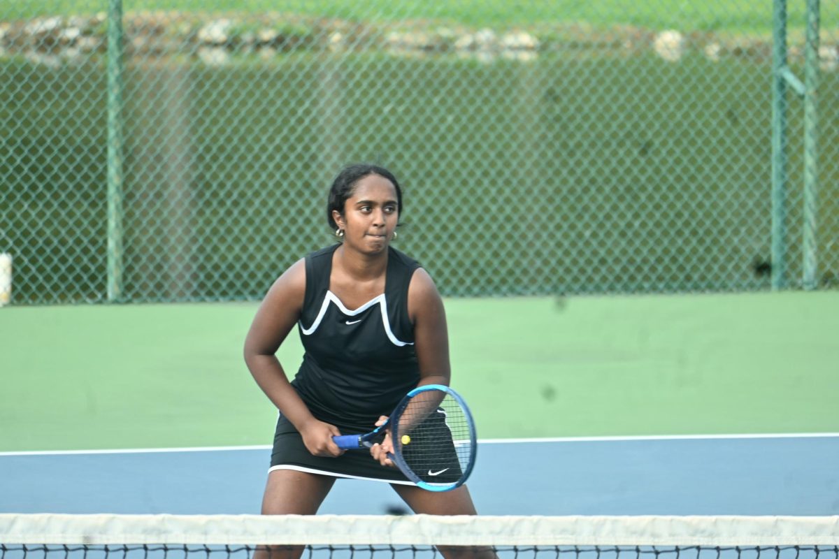 Senior Sreehitha Bollimpalli waits for the ball during a match against Jonesboro on Sep. 25.