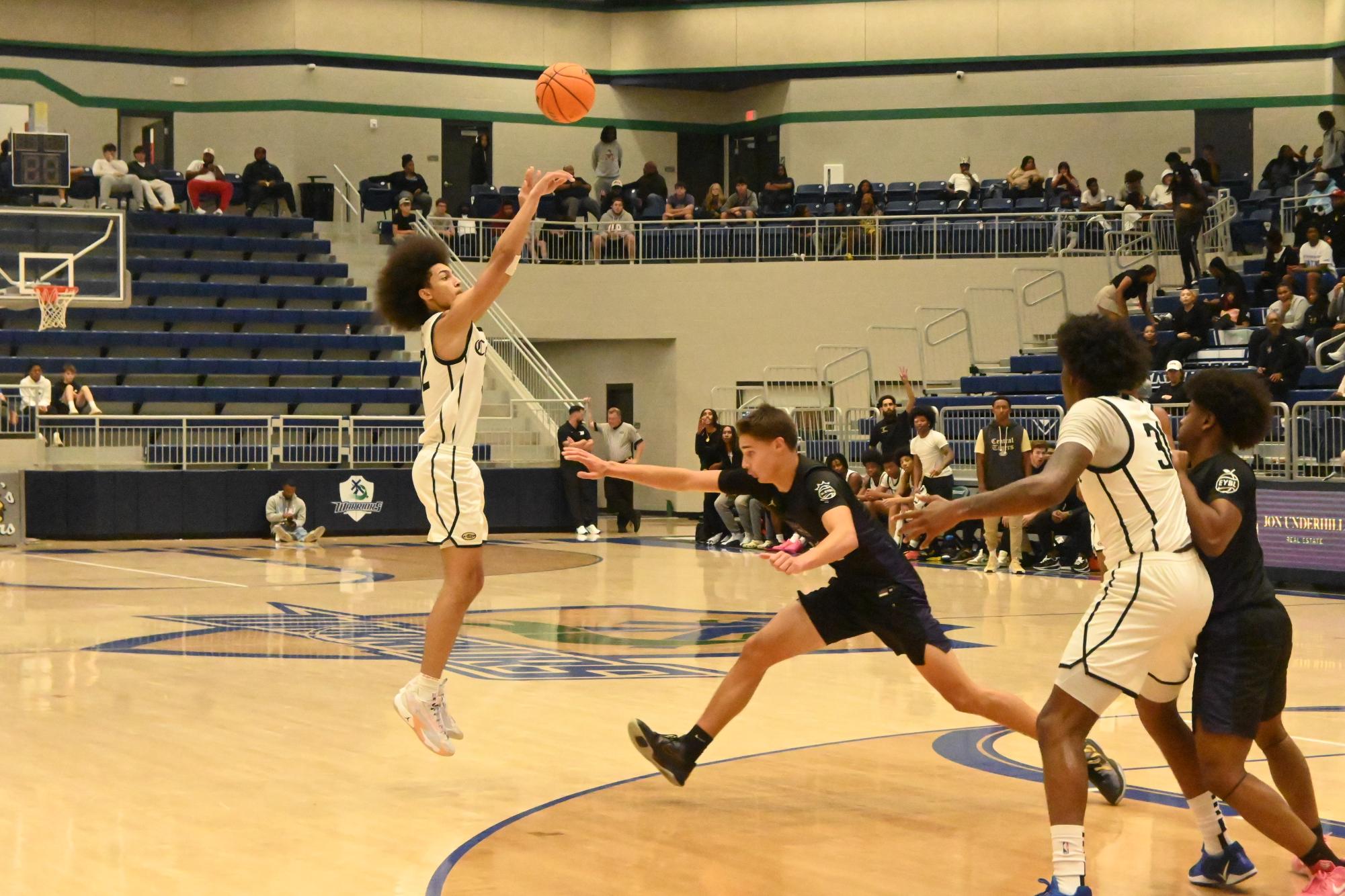 November 16 the basketball team played Fayetteville, winning by 13 points. “I’ve just been playing better and harder with my team,” said sophomore Tre Hope. Hope shoots the ball to get a point.