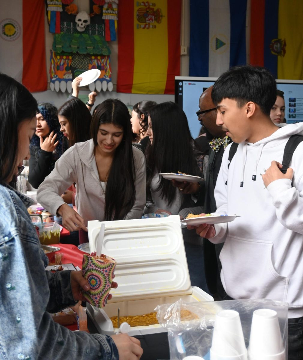 Students fill Marco Dorfsman's classroom during 80 Bites, Mar. 18.